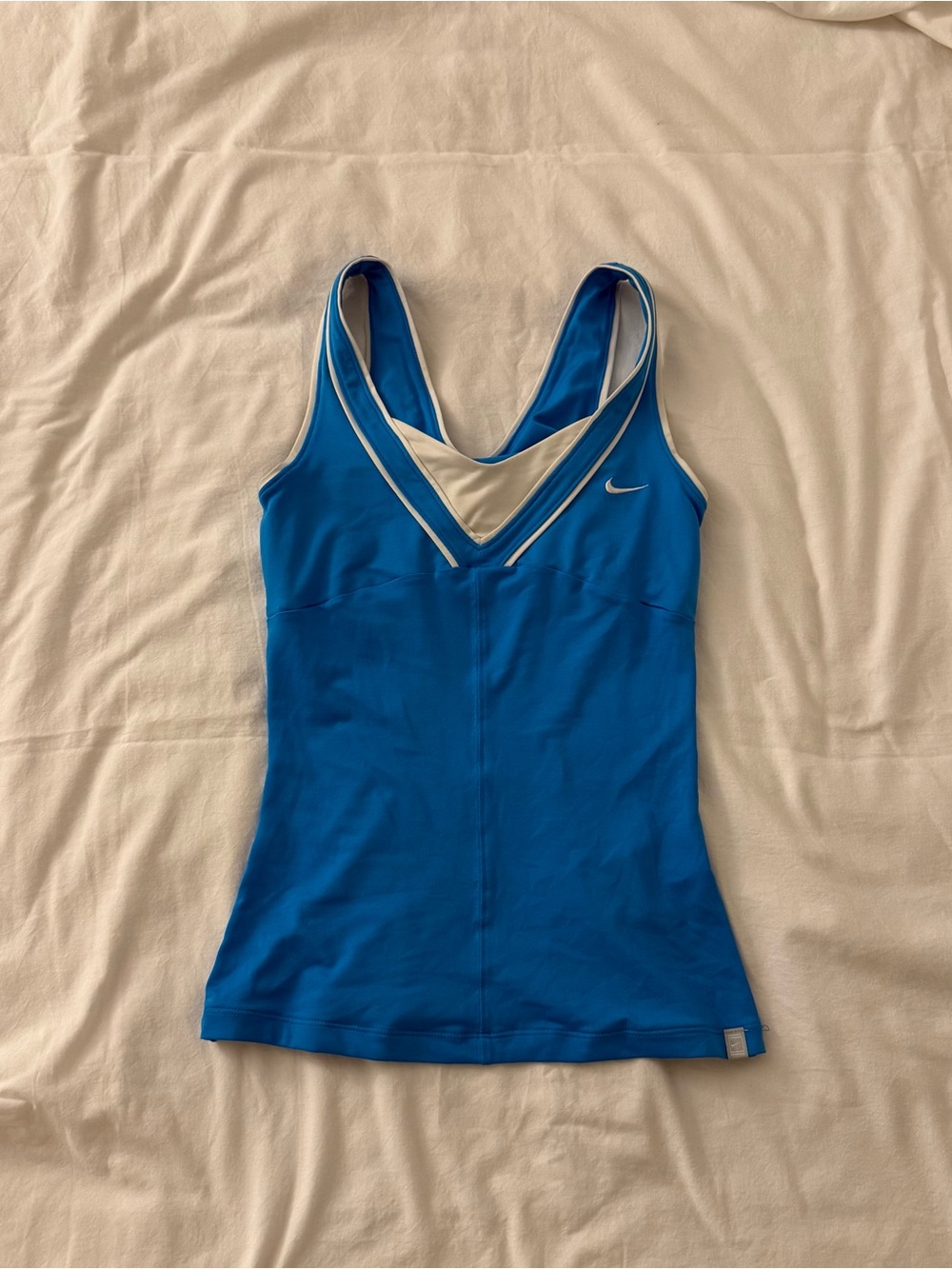 Y2K 2011 Nike blue tank top with white trim, size XS